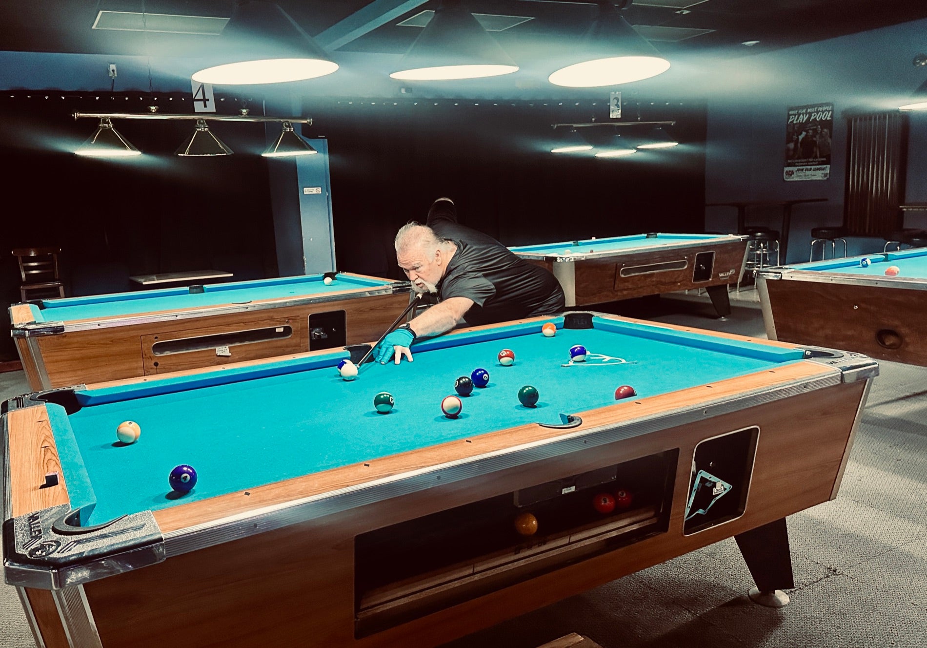 League night at Nine Mile Billiards — a NAPA of Pensacola player at the table